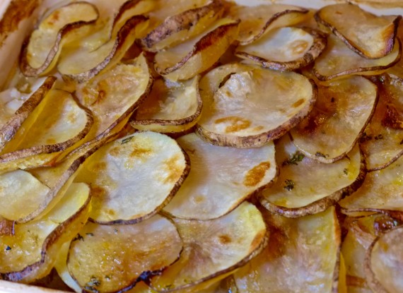 Scalloped potato in pan cooked