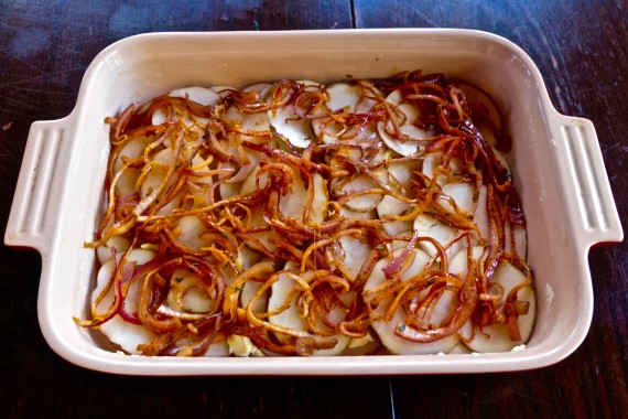 Scalloped potatos with red onion layer