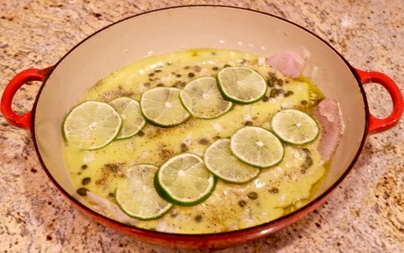 baked sole in pan with limes