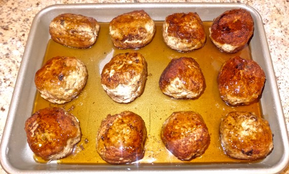 turkey meatballs in pan with sauce before baking 6