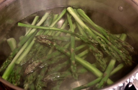 Asparagus parmesean in pot boiling