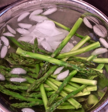 asparagus parmesean in ice bath