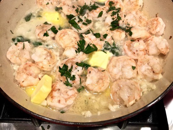 garlic shrimp in pot with butter