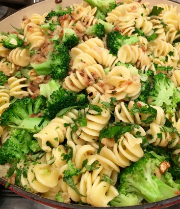 fusilli pasta with broccoli and breadcrumbs  in skillet