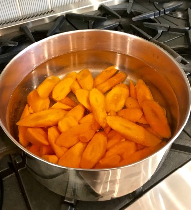 carrot pudding carrots cooking in pot