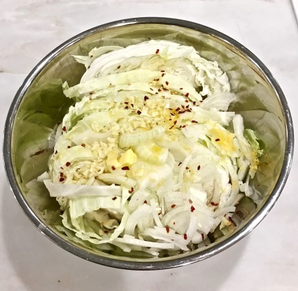 satueed cabbage ingredients in bowl