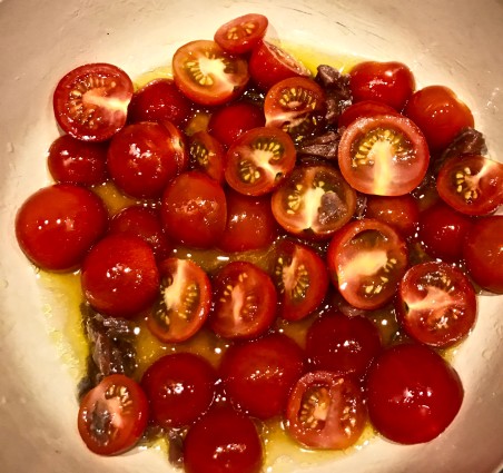 Roasted aspargus with walnuts tomatoes anchovies