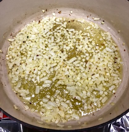 kale puttanesca onions cooking