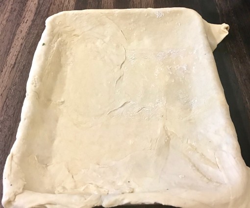 Greek pie pastry sheet on pan