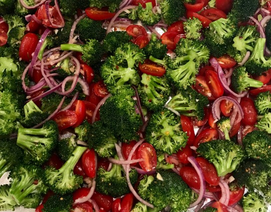 Mediterranean tomatoes all on baking sheet