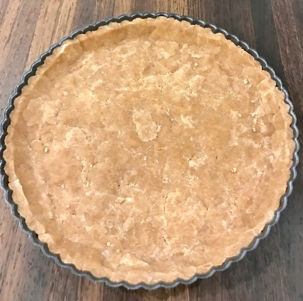 onion tart crust oressed into pan