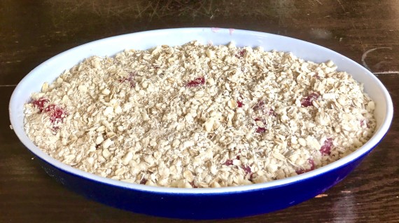 summer crisp in baking dish with topping before cok