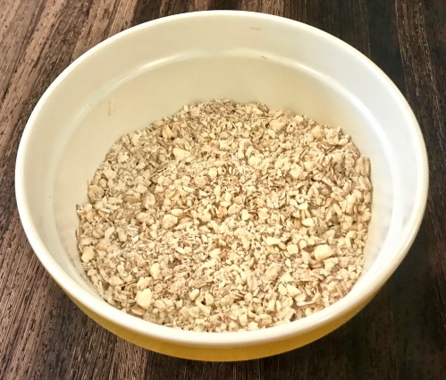 summer crisp in bowl with remaining oats